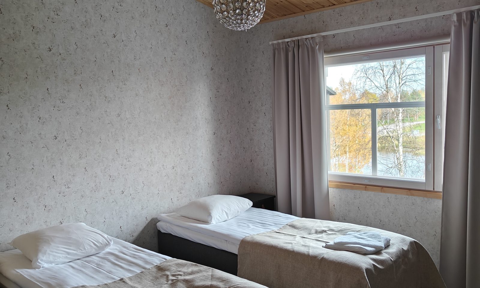 Twin bedroom in Horizon Apartment